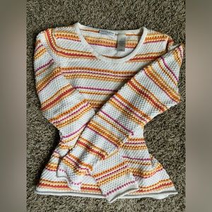 Sunset colored sweater thick yarn/material size m has a small hole.